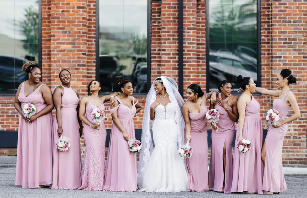 Congdon Yards Outside bride and bridesmaids in pink