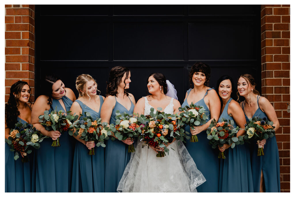 Congdon Yards Outside bride with bridesmaids in blue