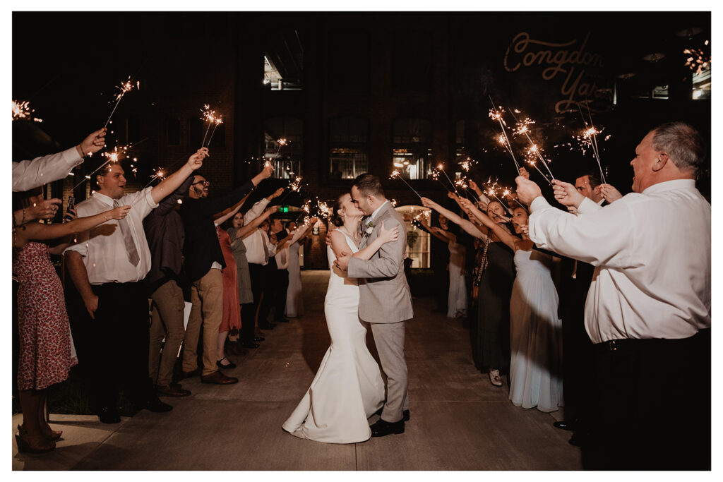 Congdon Yards Outside cheering on wedding couple