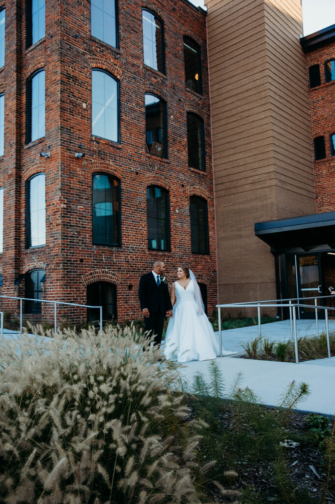 Congdon Yards Outside couple in front of brick building