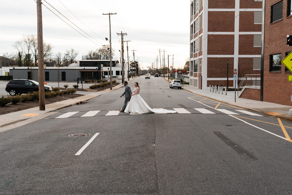 Congdon Yards Outside wedding couple crossing the street