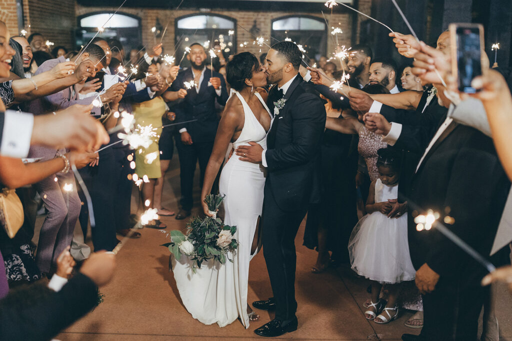 Congdon Yards Outside wedding couple surrounded by sparklers