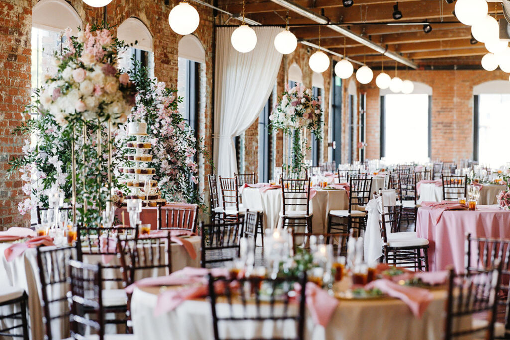 Congdon Yards Pine Room at the Loft brightly lit reception with florals