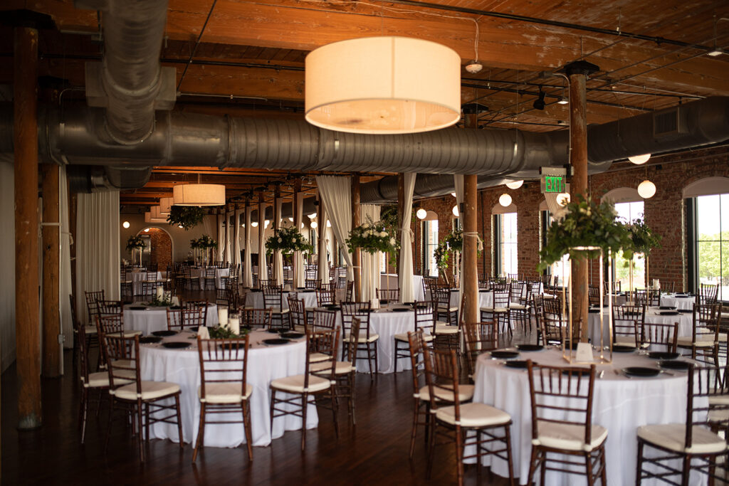 Congdon Yards Pine Room at the Loft moody lighting wedding reception tables