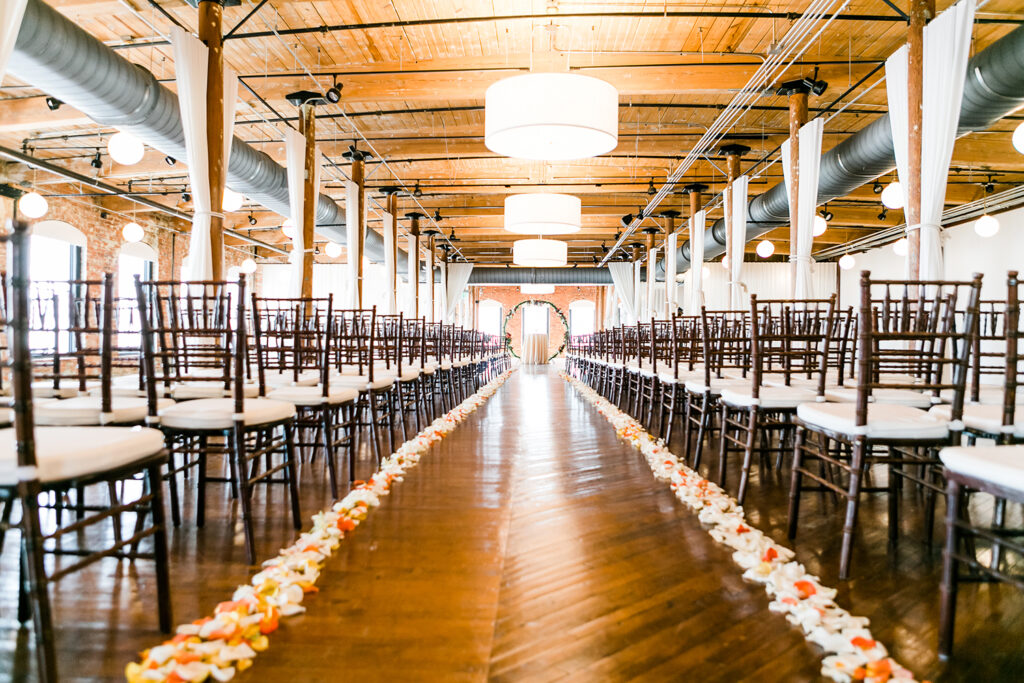 Congdon Yards Pine Room at the Loft wedding ceremony aisle empty