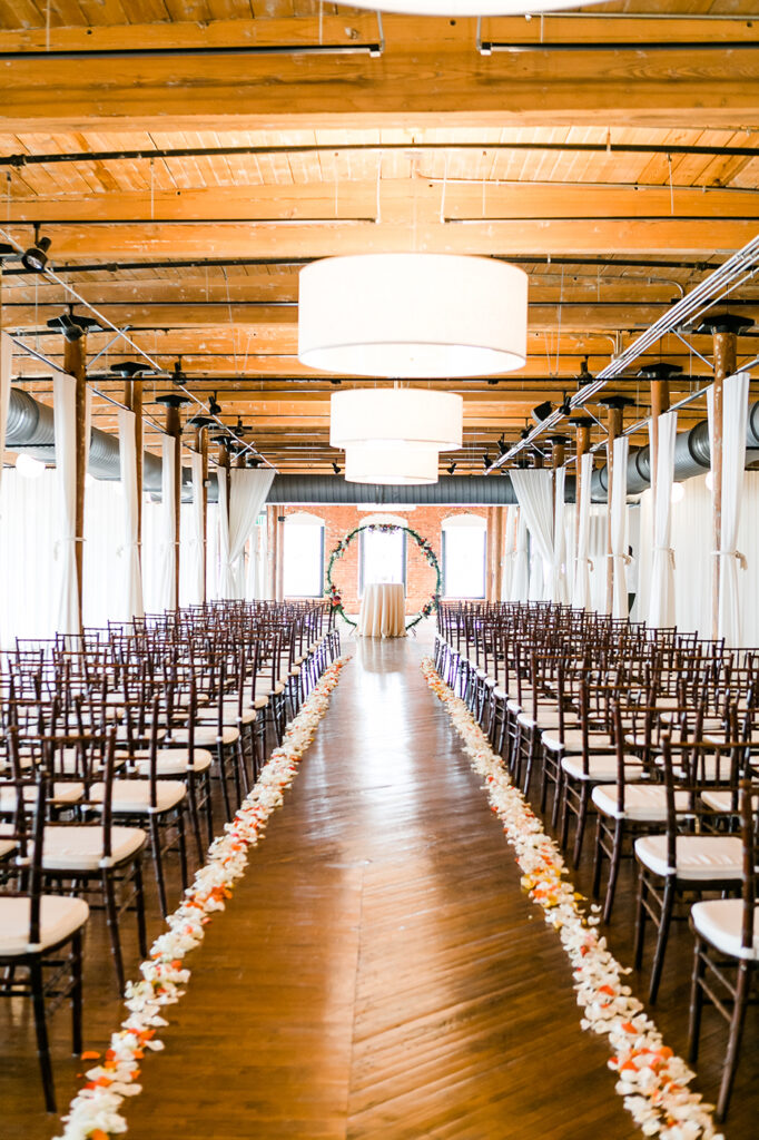 Congdon Yards Pine Room at the Loft wedding ceremony setup with empty chairs