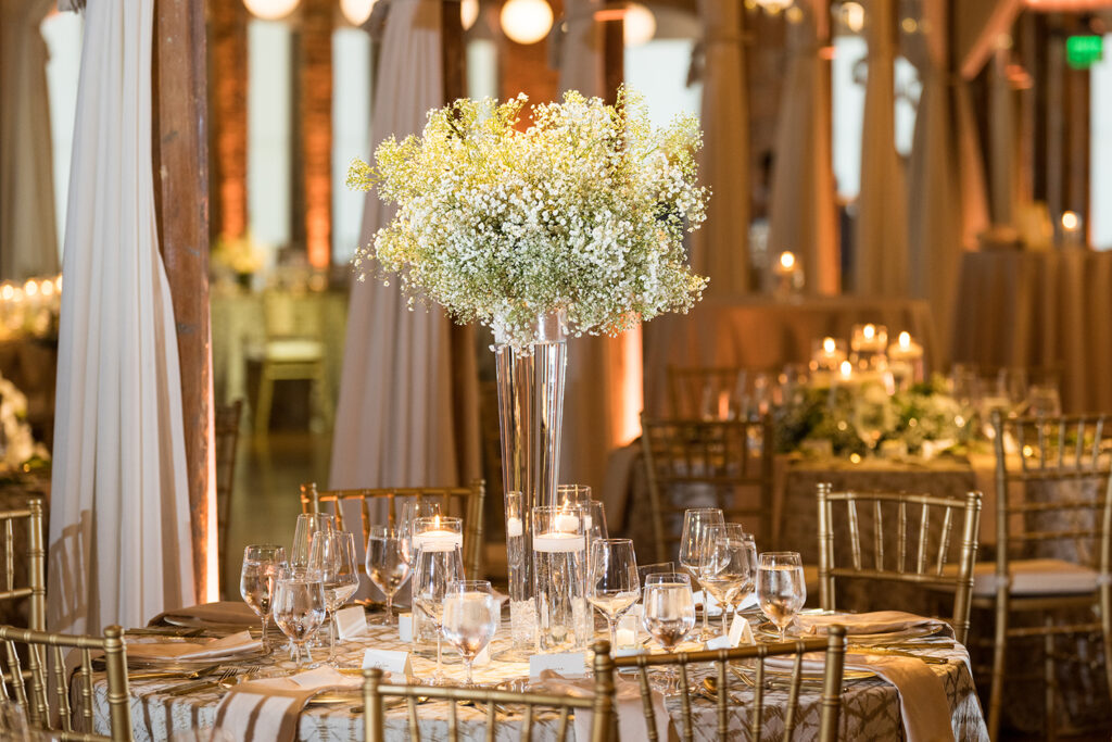 Congdon Yards Pine Room at the Loft wedding reception centerpiece with babys breath