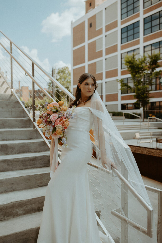 congdon yards courtyard bride on stairs closeup