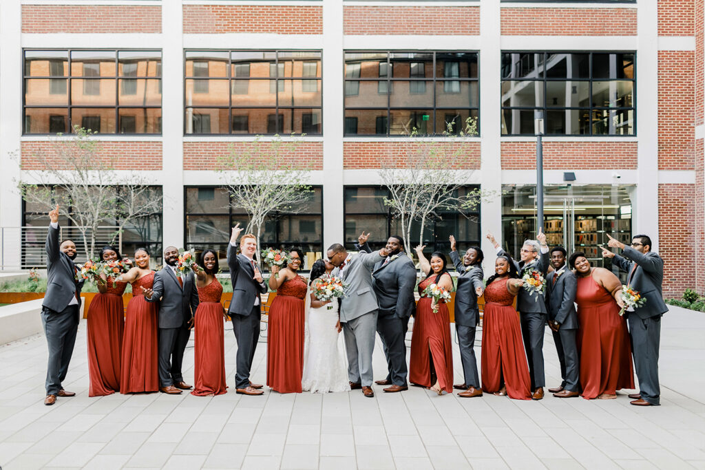 congdon yards courtyard large bridal party celebrating