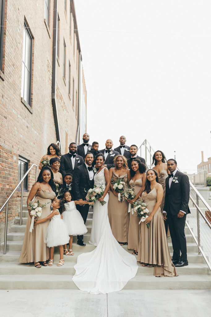 congdon yards courtyard large bridal party on stairs