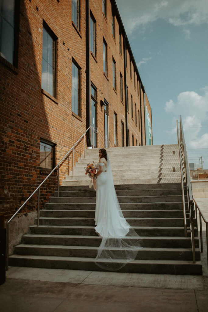 congdon yards courtyard moody bride on stairs