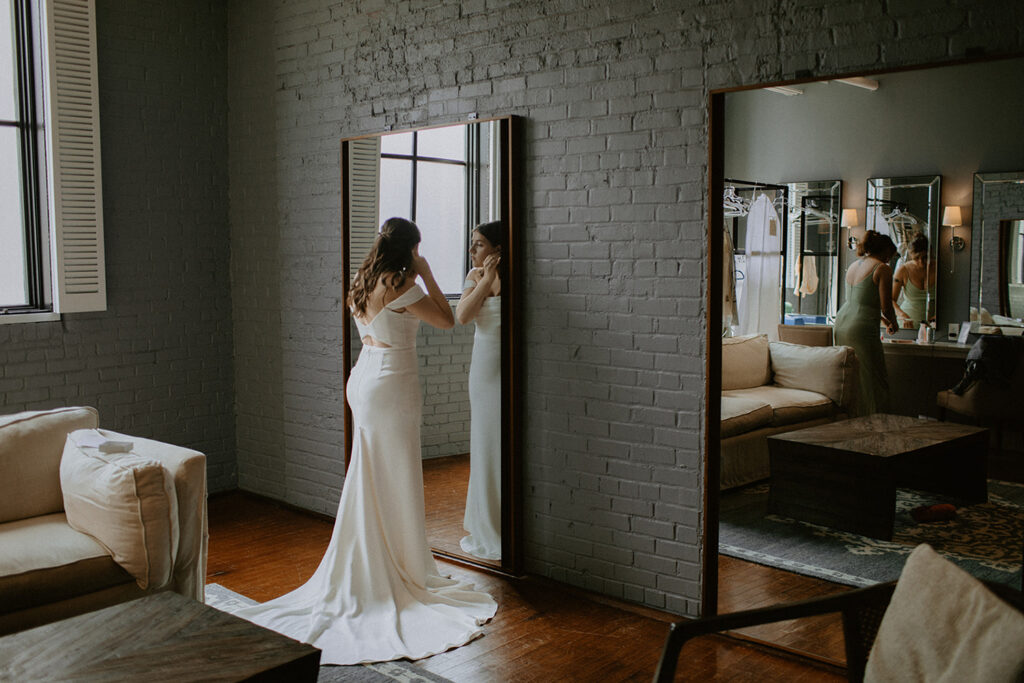 congdon yards luxe suite bride looking in mirror