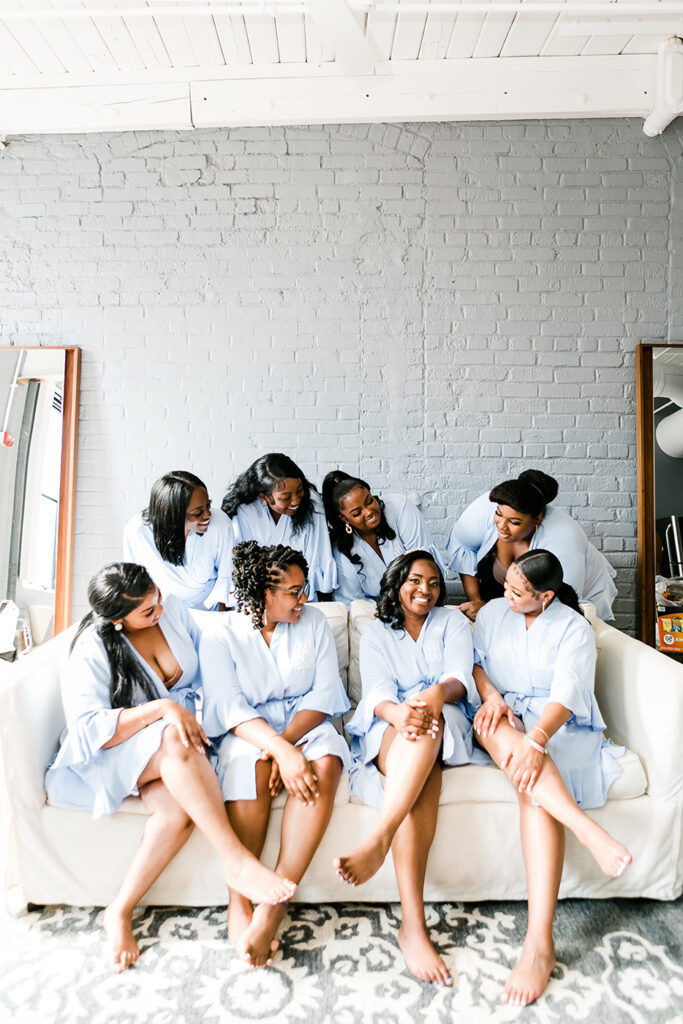 congdon yards luxe suite bridesmaids on couch together