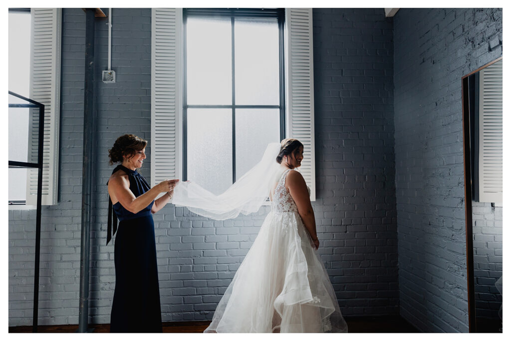 congdon yards luxe suite mom holding brides veil