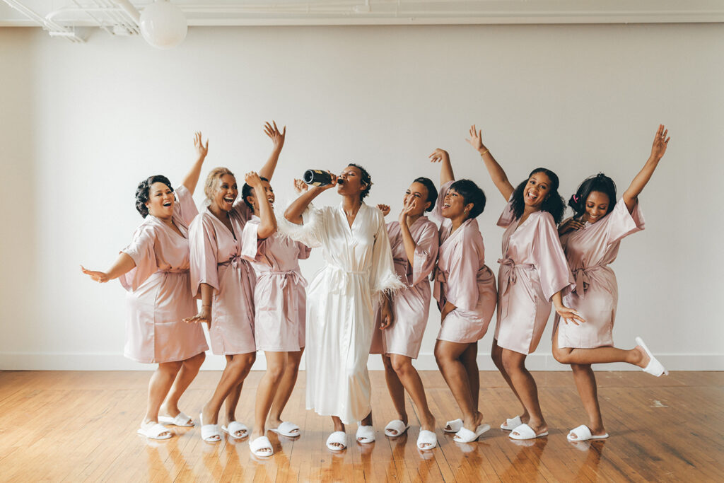 congdon yards silk room at the loft bridesmaids celebrating in robes